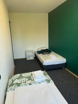 Łóżko lub łóżka w pokoju w obiekcie Samba Life Apartment