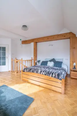 Łóżko lub łóżka w pokoju w obiekcie Apartament Krakowskie Przedmiescie