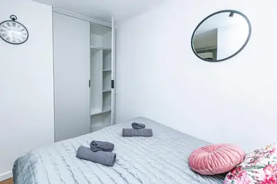Łóżko lub łóżka w pokoju w obiekcie Żelazna 58 62 - Better Rental