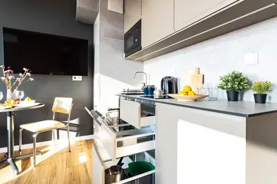 Kuchnia lub aneks kuchenny w obiekcie Wiktoryn 234 SuperApart - Studio with Air Conditioner