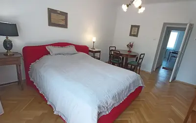 Łóżko lub łóżka w pokoju w obiekcie Warsaw Day 1 - Room in the City Center