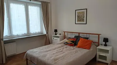 Łóżko lub łóżka w pokoju w obiekcie Warsaw Day 1 - Room in the City Center