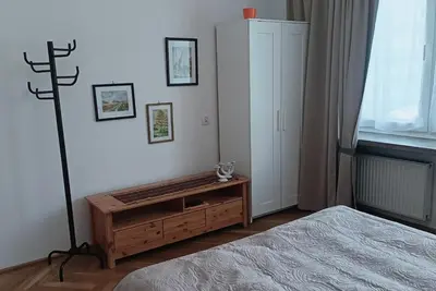 Łóżko lub łóżka w pokoju w obiekcie Warsaw Day 1 - Room in the City Center