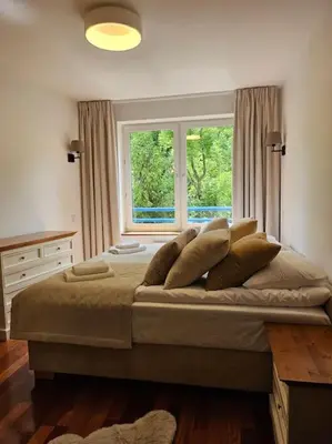Łóżko lub łóżka w pokoju w obiekcie Apartament Drawska