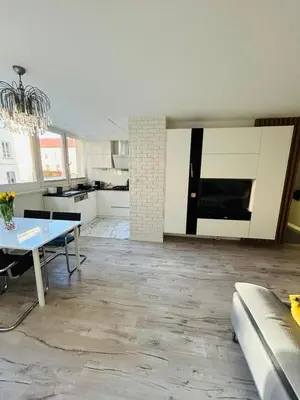 Telewizja i/lub zestaw kina domowego w obiekcie Stare Miasto - Apartament Trębacka