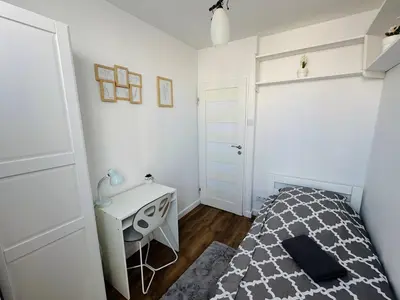 Łóżko lub łóżka w pokoju w obiekcie Warszawa Centralna Rooms