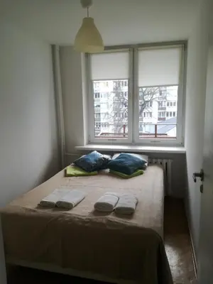 Łóżko lub łóżka w pokoju w obiekcie Srebrna Center Apartment