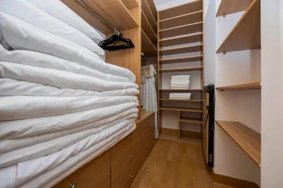 Łóżko lub łóżka w pokoju w obiekcie Family Apartment with Parking Mokotów Warsaw by Noclegi Renters
