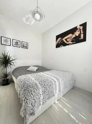Łóżko lub łóżka w pokoju w obiekcie Luksusowy apartament dwupokojowy w TritonPark