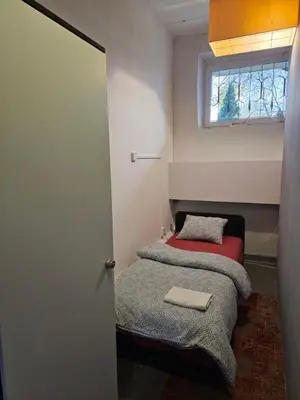 Łóżko lub łóżka w pokoju w obiekcie Przy Metro Wierzbno
