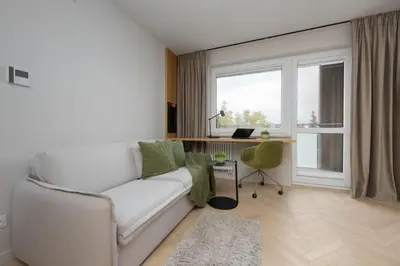 Część wypoczynkowa w obiekcie Pileckiego Apartments with Parking & Balcony by Noclegi Renters