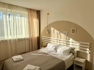 Łóżko lub łóżka w pokoju w obiekcie OhMyHome-Złota View Apartment