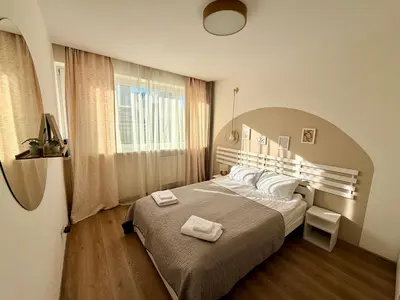 Łóżko lub łóżka w pokoju w obiekcie OhMyHome-Złota View Apartment