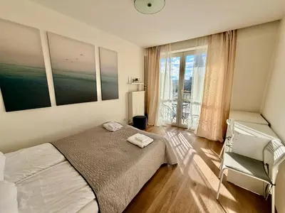 Łóżko lub łóżka w pokoju w obiekcie OhMyHome-Złota View Apartment