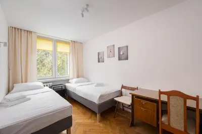 Łóżko lub łóżka w pokoju w obiekcie Mokotów Bełska Homely Apartment by BookingHost