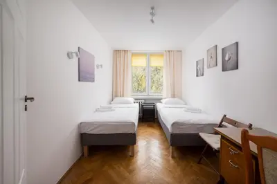 Łóżko lub łóżka w pokoju w obiekcie Mokotów Bełska Homely Apartment by BookingHost