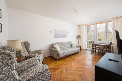 Telewizja i/lub zestaw kina domowego w obiekcie Mokotów Bełska Homely Apartment by BookingHost
