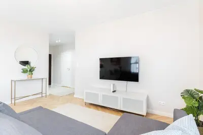 Telewizja i/lub zestaw kina domowego w obiekcie Superb Place to Live Mokotow 8th floor suite