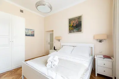 Łóżko lub łóżka w pokoju w obiekcie Apartament Plac Konstytucji