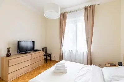 Łóżko lub łóżka w pokoju w obiekcie Apartament Plac Konstytucji