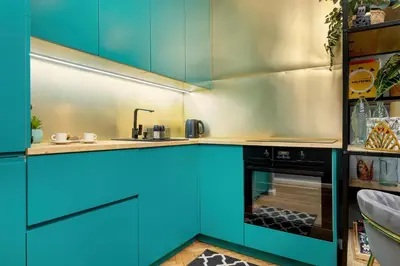 Kuchnia lub aneks kuchenny w obiekcie City Center Turquoise Residence Warsaw by Noclegi Renters