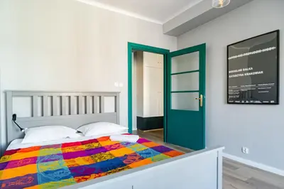 Łóżko lub łóżka w pokoju w obiekcie Apartament Warszawa-Centrum free parking