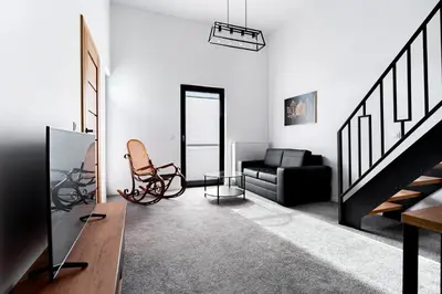 Telewizja i/lub zestaw kina domowego w obiekcie Modern apartment with sauna