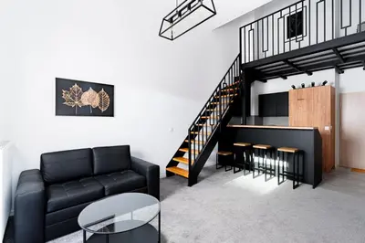 Część wypoczynkowa w obiekcie Modern apartment with sauna