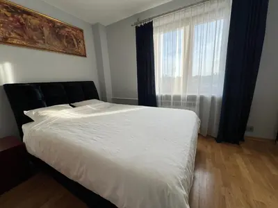 Łóżko lub łóżka w pokoju w obiekcie Apartament na Praskiej Uliczce