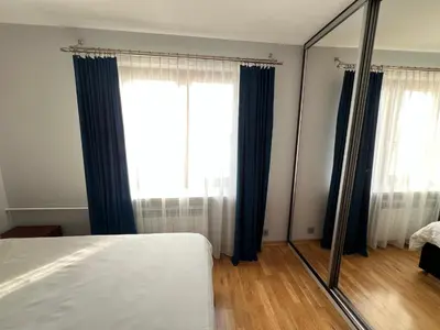 Łóżko lub łóżka w pokoju w obiekcie Apartament na Praskiej Uliczce