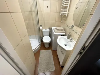 Łazienka w obiekcie Cosy central apartment