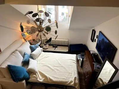 Telewizja i/lub zestaw kina domowego w obiekcie Central, top floor apartment