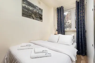 Łóżko lub łóżka w pokoju w obiekcie Apartament Dąbrowskiego by Your Freedom