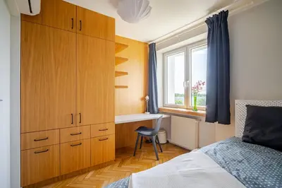 Łóżko lub łóżka w pokoju w obiekcie Niesamowity Widok Warszawa