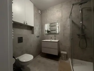 Łazienka w obiekcie KASKADY Airport modern apartments - close to the airport - 10 min, and city center - 15 min