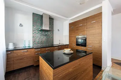 Kuchnia lub aneks kuchenny w obiekcie Sadyba apartament