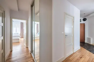 Łóżko lub łóżka w pokoju w obiekcie Sadyba apartament