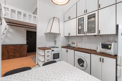 Kuchnia lub aneks kuchenny w obiekcie Poznańska 11 - A by Homeprime