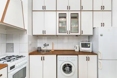Kuchnia lub aneks kuchenny w obiekcie Poznańska 11 - A by Homeprime