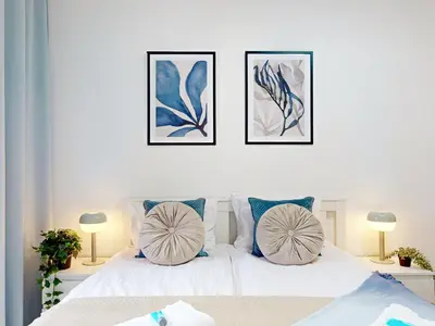 Łóżko lub łóżka w pokoju w obiekcie Vista Apartment Balcony AC Parking Metro Plocka