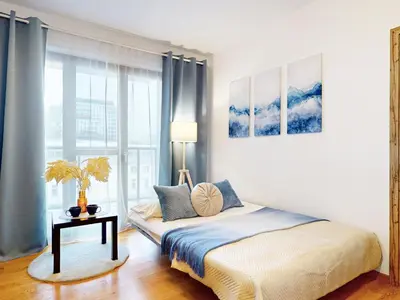 Łóżko lub łóżka w pokoju w obiekcie Vista Apartment Balcony AC Parking Metro Plocka