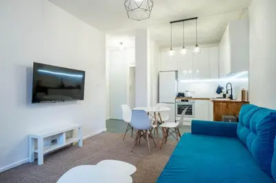Telewizja i/lub zestaw kina domowego w obiekcie Wilcza Apartment in the Centre of Warsaw