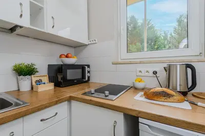 Kuchnia lub aneks kuchenny w obiekcie ShortStayPoland Jana Sobieskiego B82