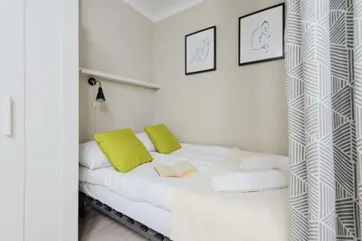 Łóżko lub łóżka w pokoju w obiekcie ShortStayPoland Jana Sobieskiego B82