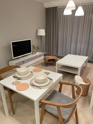 Telewizja i/lub zestaw kina domowego w obiekcie Warsaw City Center Apartment - with Free Parking