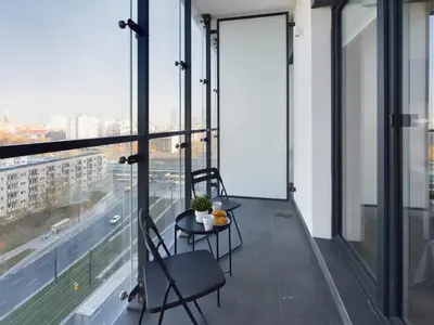 Balkon lub taras w obiekcie Modern, Air-conditioned Studio in the Centre of Warsaw by Noclegi Renters