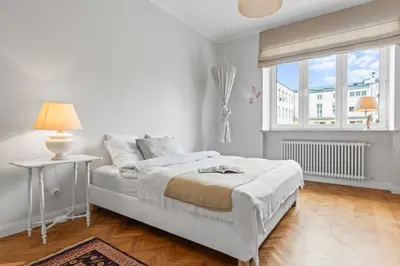 Łóżko lub łóżka w pokoju w obiekcie Apartament Różana