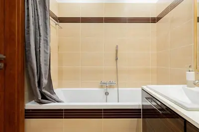 Łazienka w obiekcie Urban Blue 2 Bedroom Apartment Wola