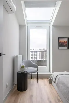 Łóżko lub łóżka w pokoju w obiekcie Apartament na Herbu Oksza 18