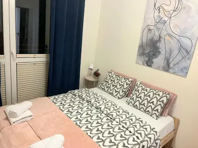 Łóżko lub łóżka w pokoju w obiekcie Rental Apartments Racławicka